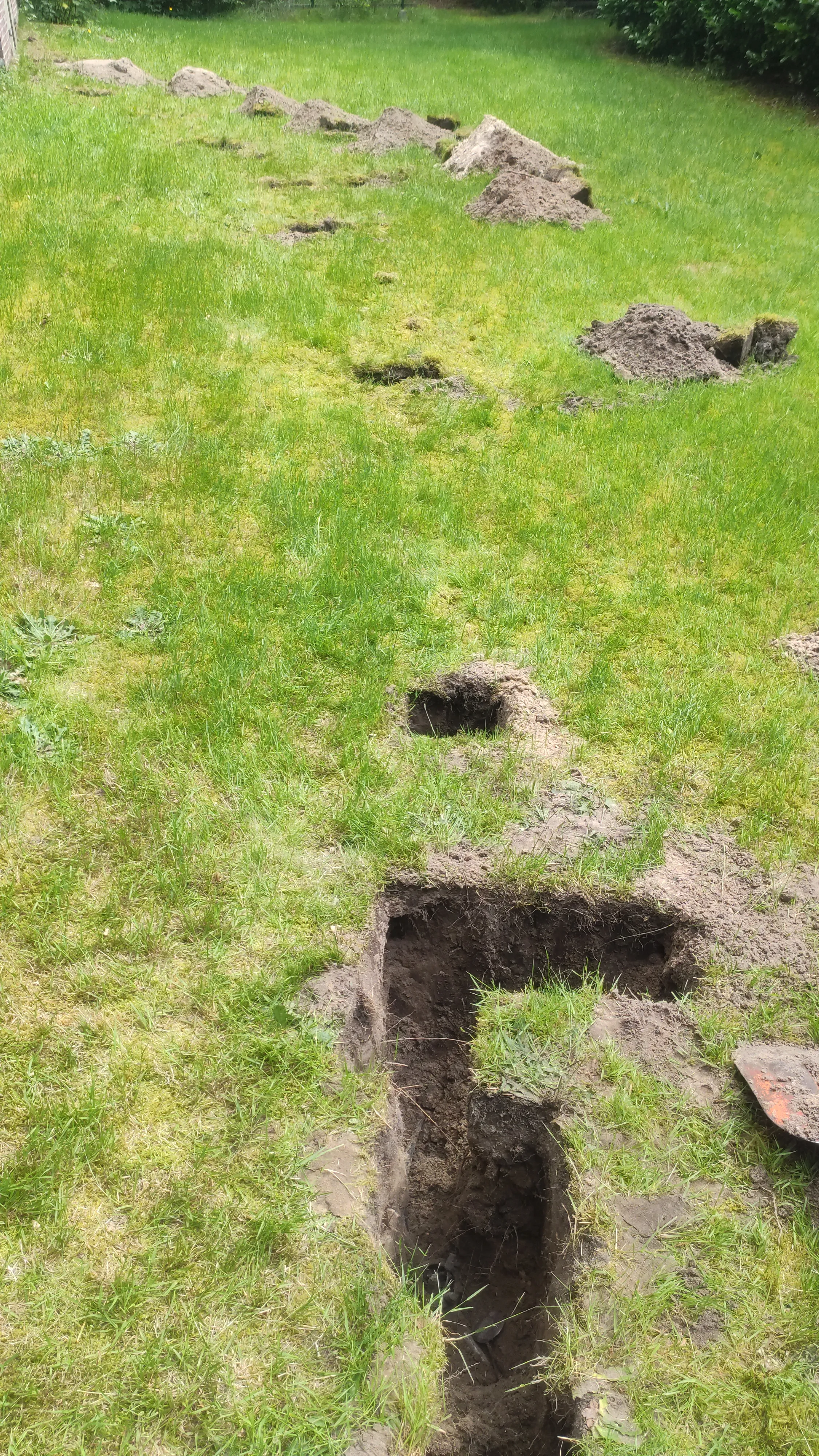 The holes to follow underground cables