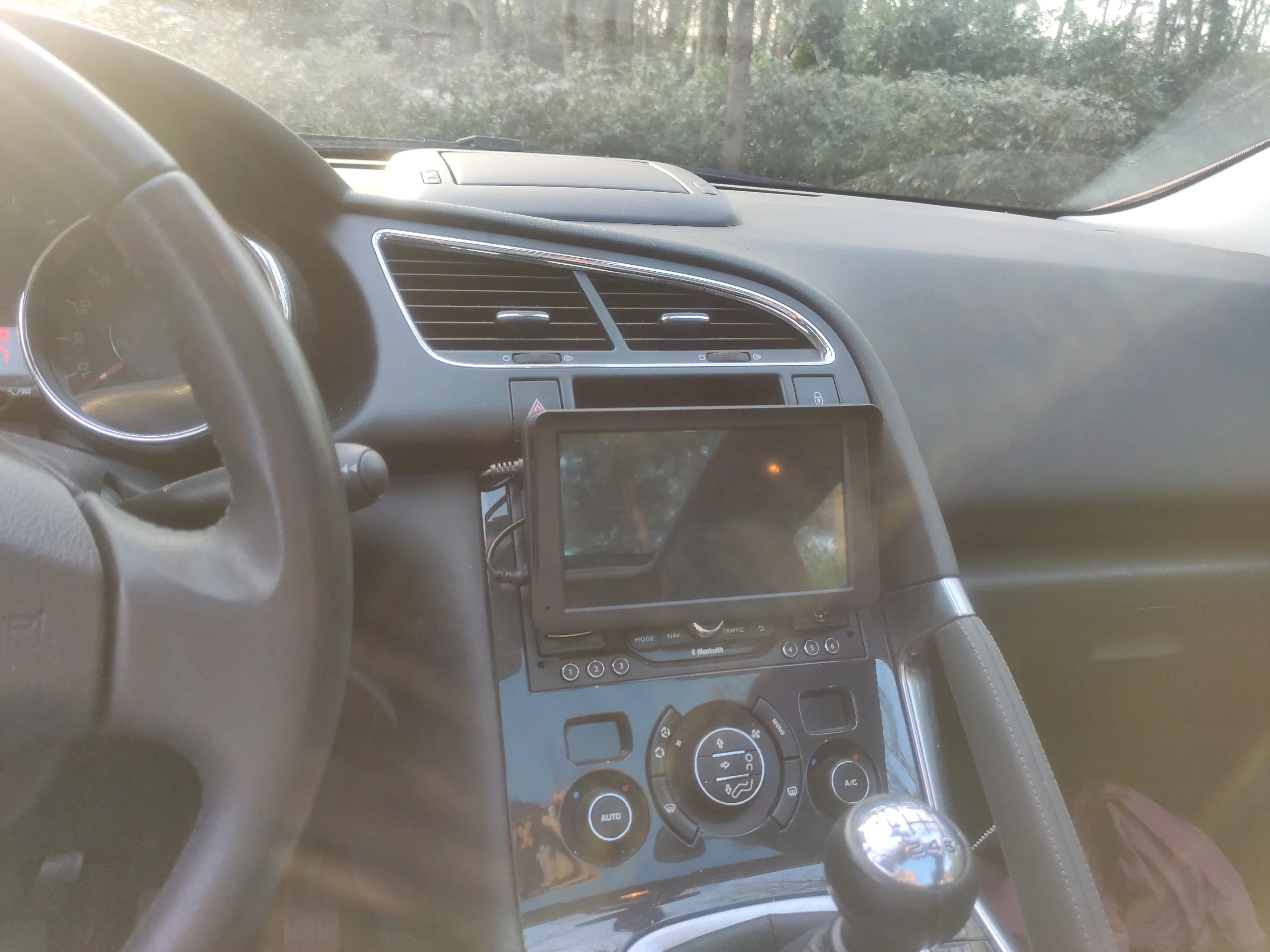 The screen mounted in the car