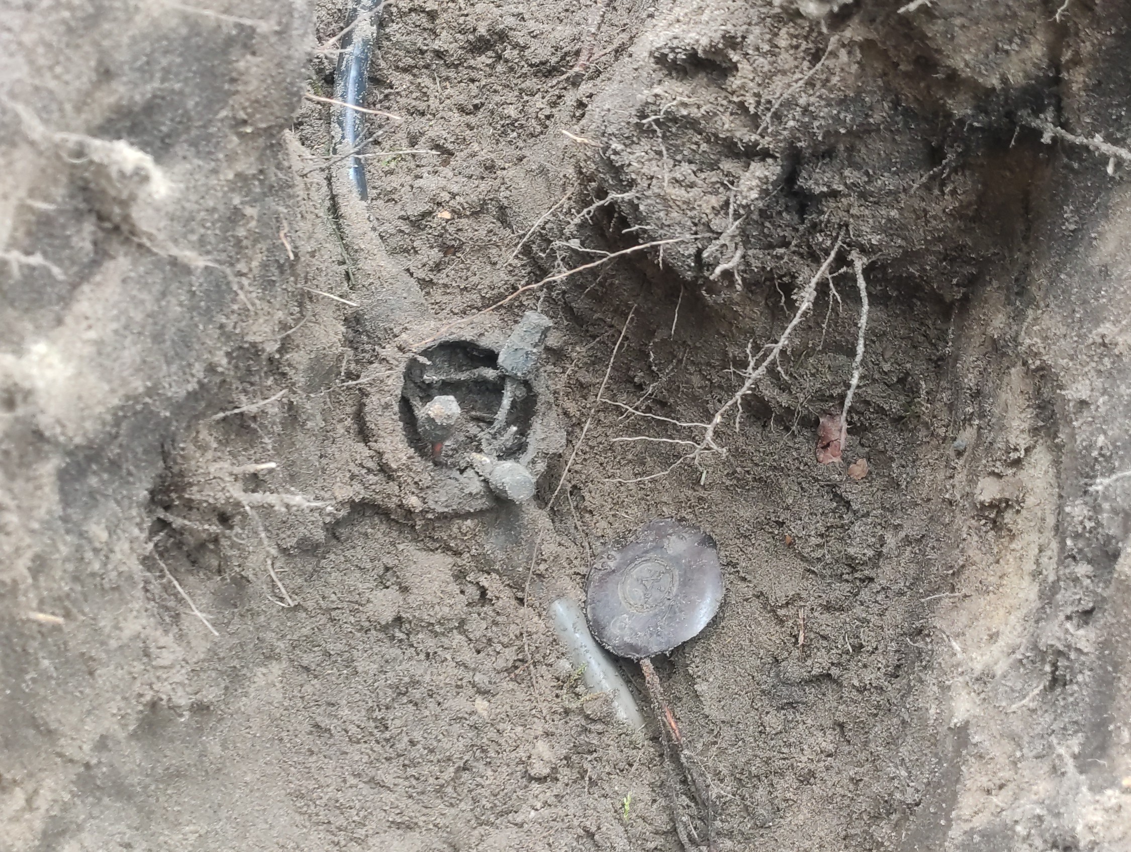 A broken underground junction box