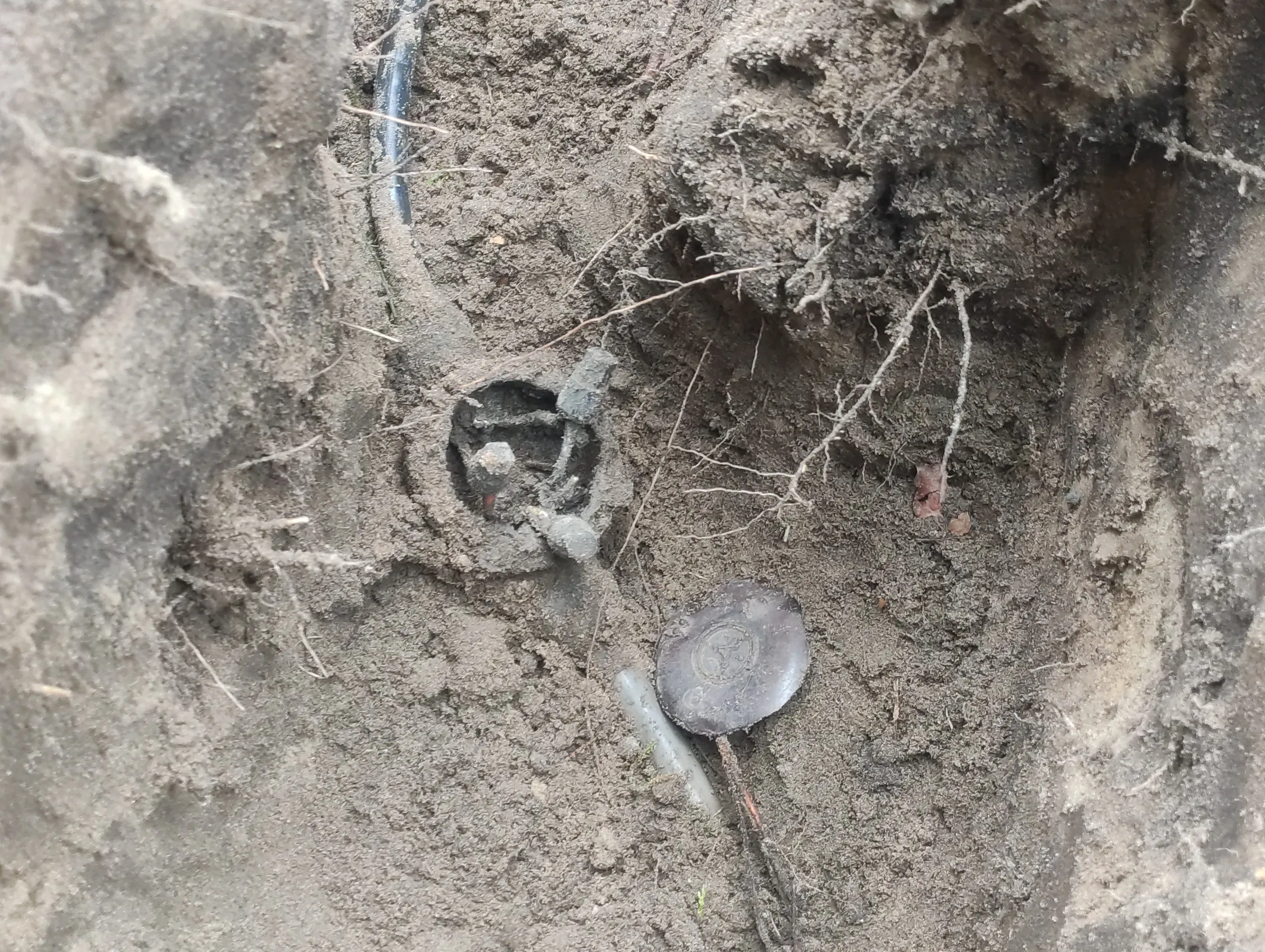 A broken underground junction box